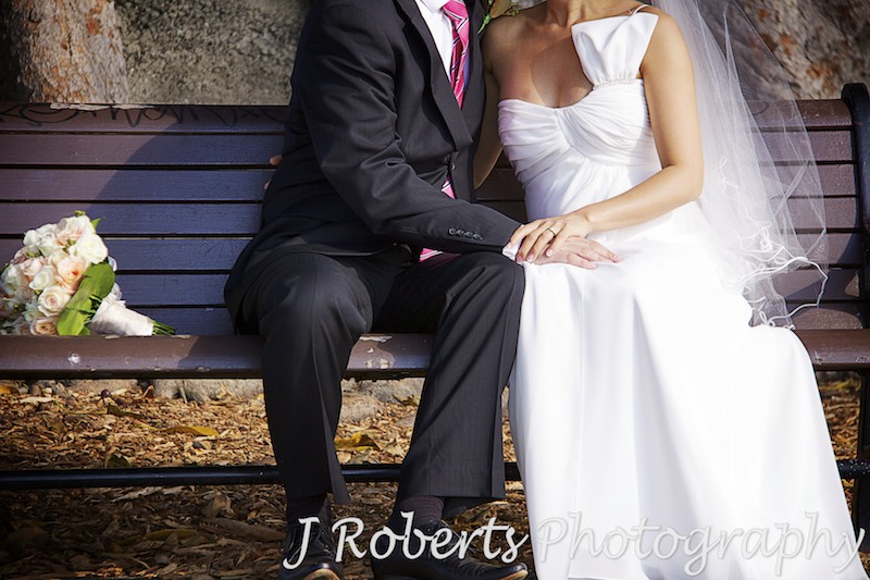 Holding hands on lap - wedding photography sydney
